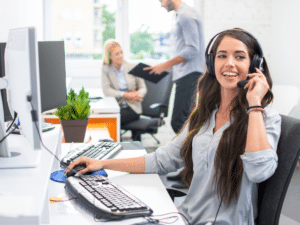 Smiling customer service representative with a headset,